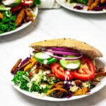Vegan Doner Kebab with whole spelt / wheat kebab bread, coleslaw, soy curls / seitan and kebab sauce.