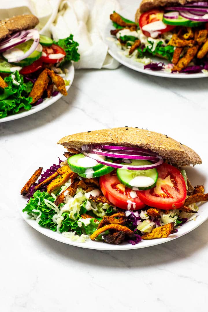 Vegan Doner Kebab with whole spelt / wheat kebab bread, coleslaw, soy curls / seitan and kebab sauce.