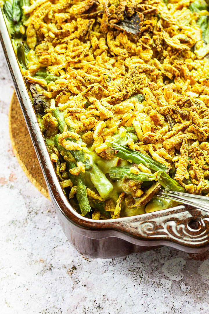 Vegan Green Bean Casserole with homemade Cambpell's cream of mushrooms and topped with homemade french fried onions (whole food plant-based)