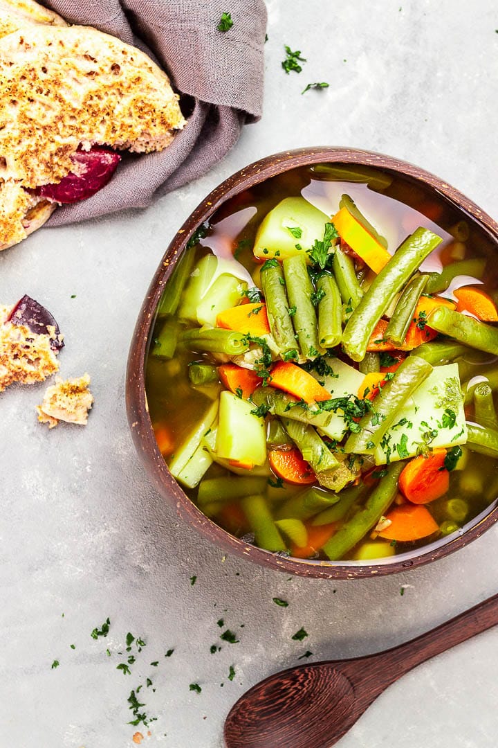 Vegan Green Bean Soup with a bold veggie broth and potatoes and carrots.