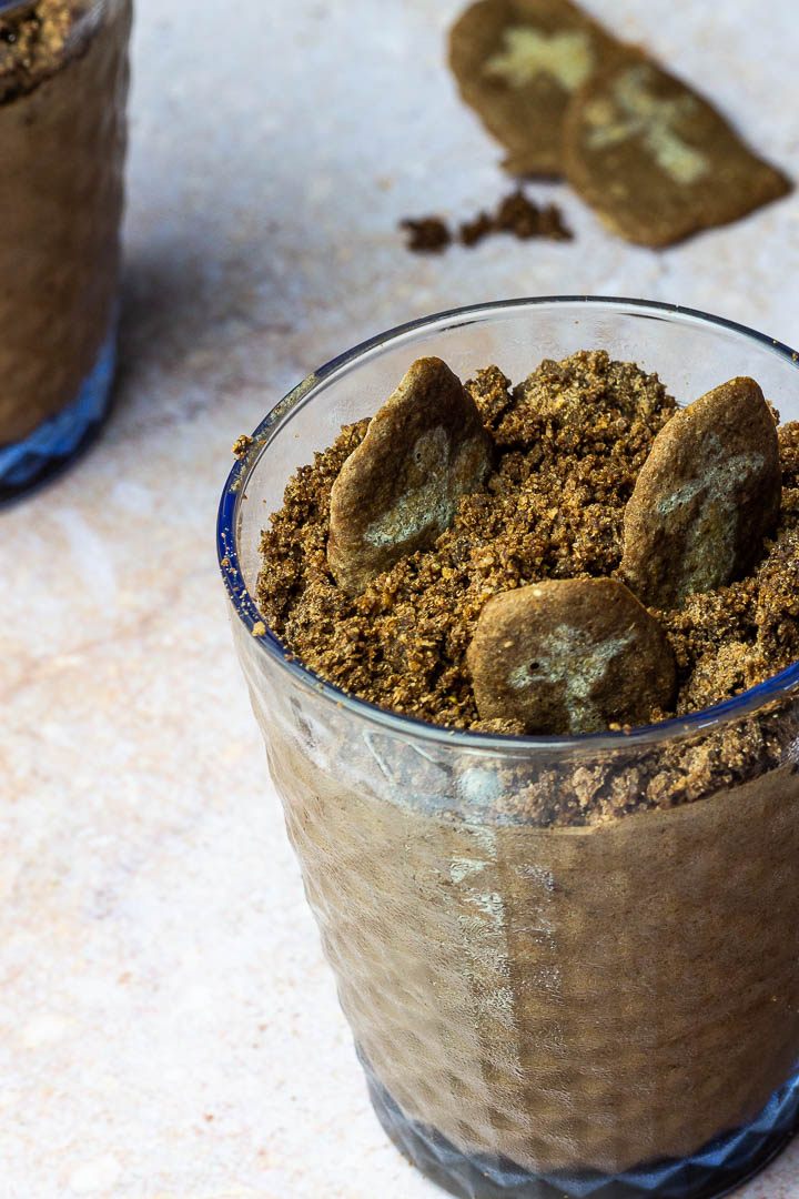 vegan Chocolate Mousse like dirt cup dessert for Halloween with Crumbs and Gravestones