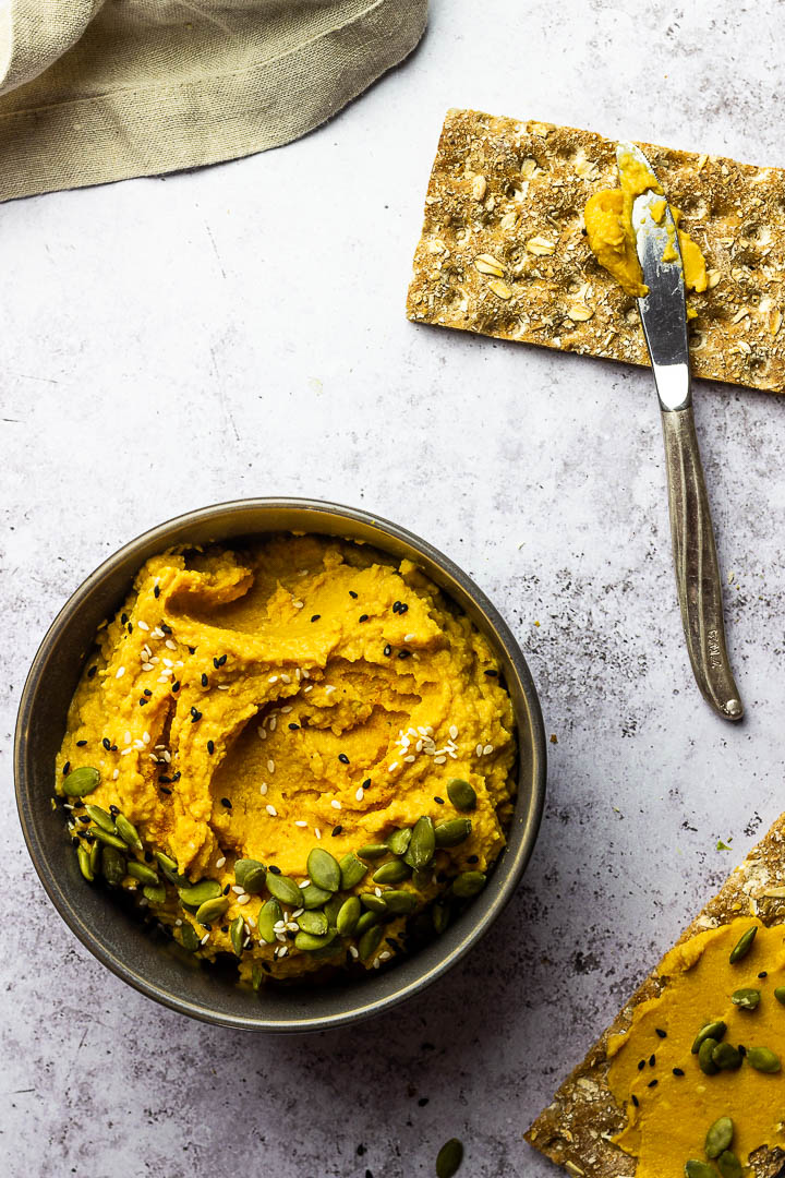 Savory Vegan Pumpkin Hummus with cooked Chickpeas, pureed Pumpkin, Mace, Nutmeg for a wfpb Dip or Spread. Perfect as an appetizer on Thanksgiving