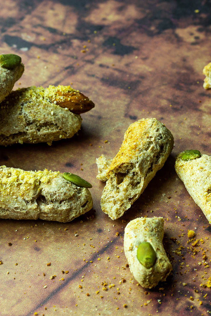 Halloween Bread Sticks in shape of witch fingers with vegan parmesan cheese and Almond / Pumpkin Seed Fingernails. Crunchy Fluffy Bread Sticks made of whole spelt / wheat pizza dough