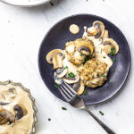Vegan Semmelknödel are German Bread Dumplings. Presentation in a bowl with some mushroom stroganoff