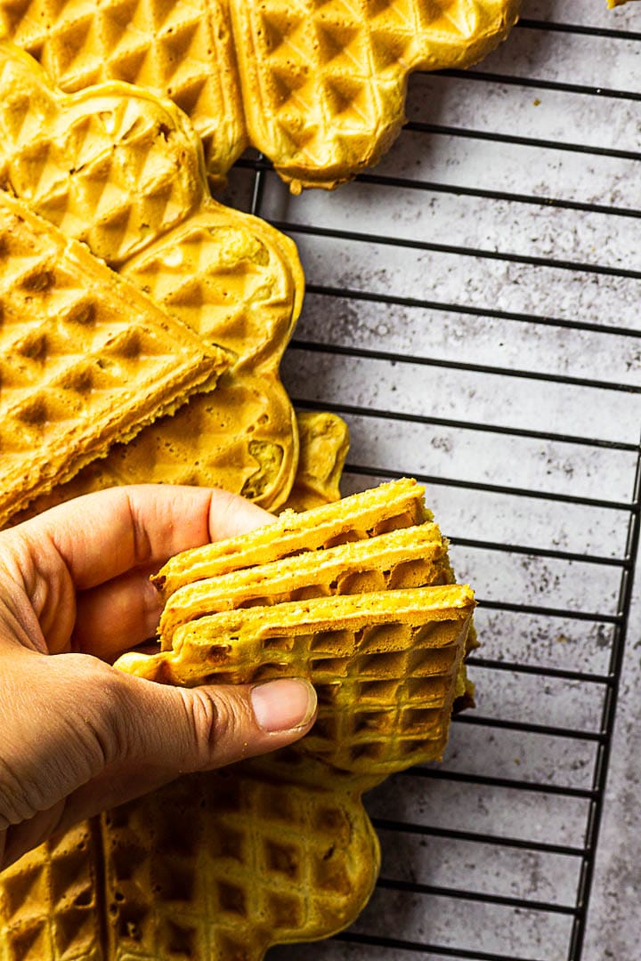 Vegan Whole Wheat Waffles on a rack. These are made without oil or butter.