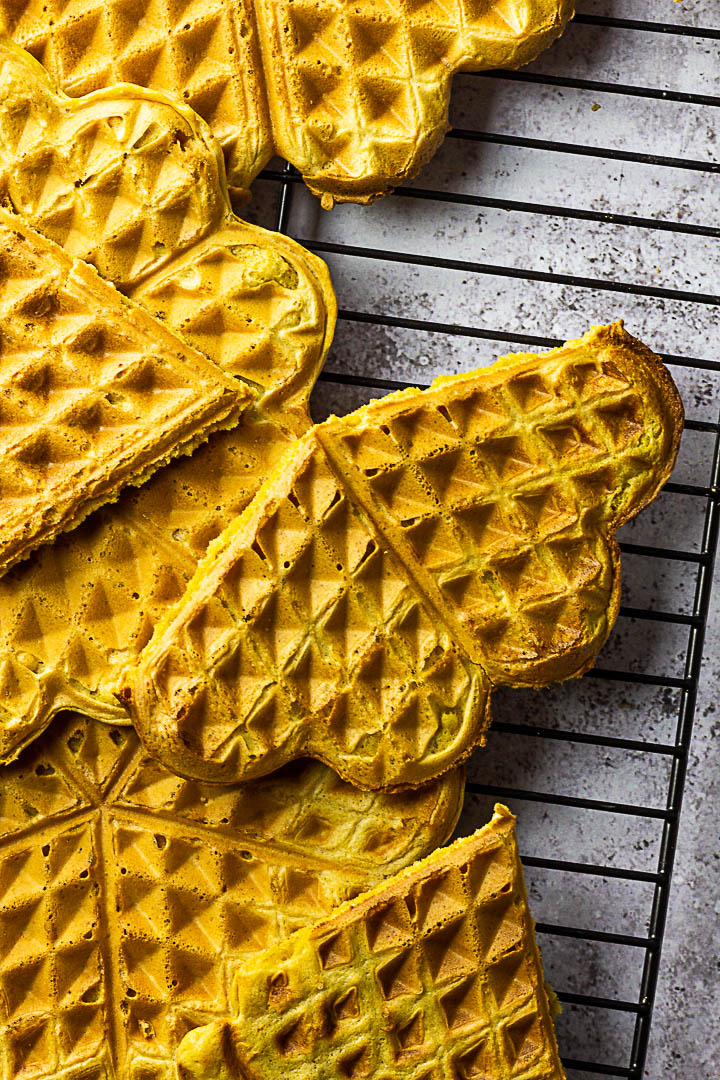 Vegan Whole Wheat Waffles on a rack. These are made without oil or butter.