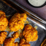 Vegan Buffola wings made with cauliflower. This authentic buffalo sauce fits perfect to cauliflowers and a vegan ranch dip (wfpb)