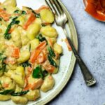Vegan Wfpb Gorgonzola Gnocchi with spinach and vegan smoked carrot salmon. Tangy Flavorful cream sauce made with natural ingredients for a healthy dinner. (vegetarian)