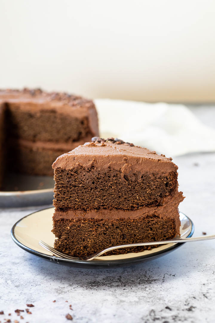 Close up of one piece of vegan chocolate layer cake