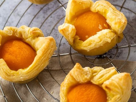 Vegan Custard Apricot Cups on a wire rack.