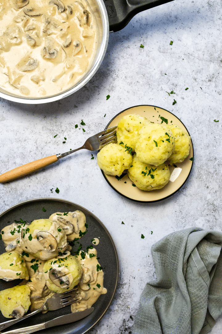 Bird view of potato dumplings and creamy mushroom sauce