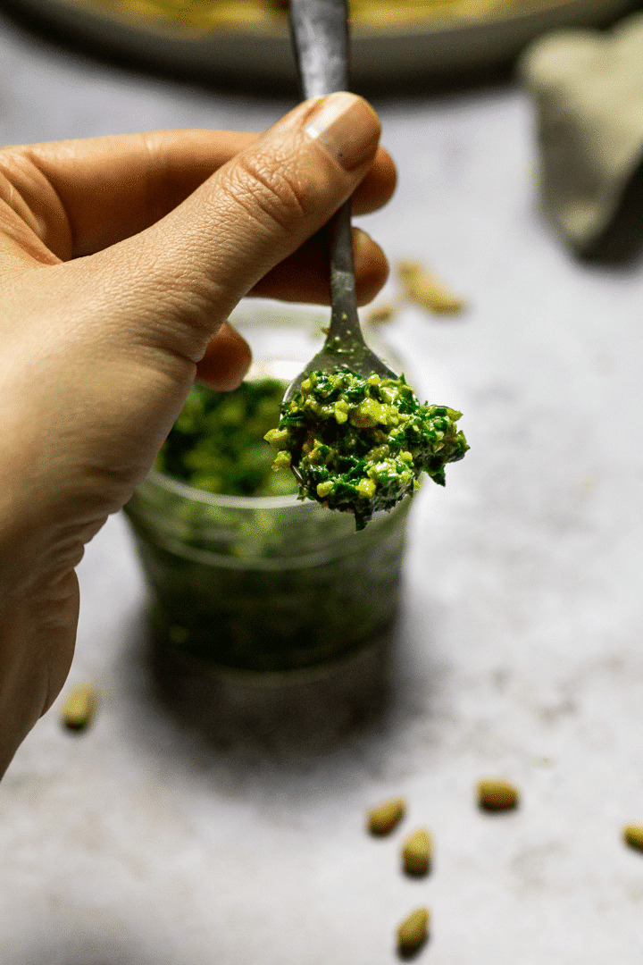 Vegan Oil-free Basil Pesto on a spoon.