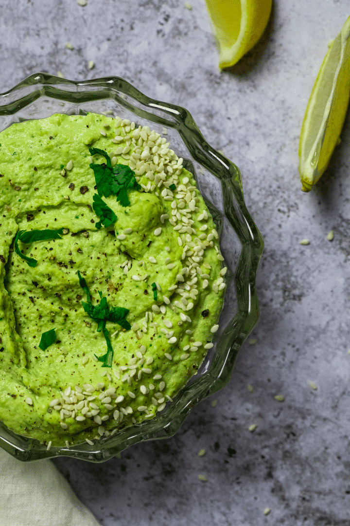 Close up shot of a bowl with edamame hummus