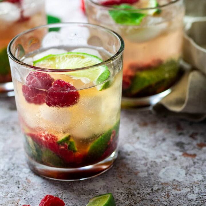 3 jars with raspberry mojito cocktail