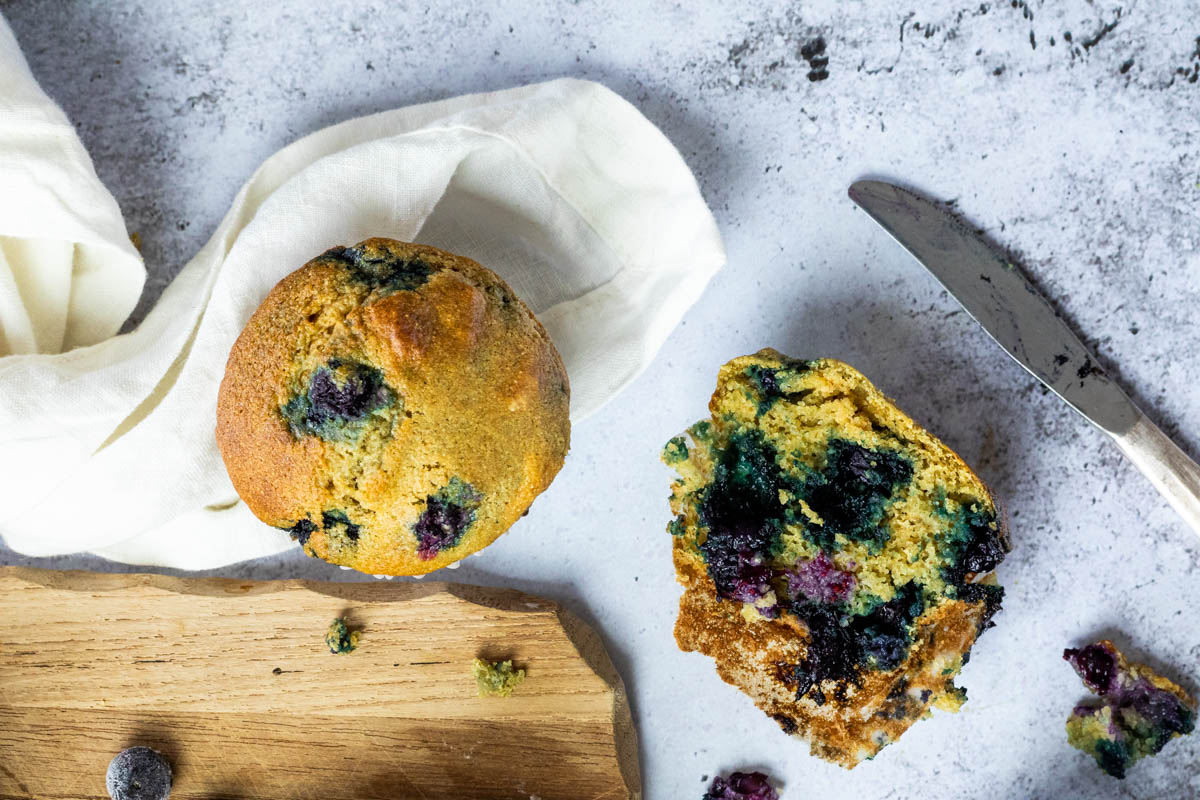 Cutted blueberry Muffin in half. With the cutted side in focus