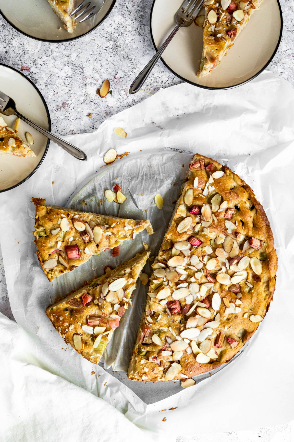 Whole Rhubarb Cake with 5 slices .