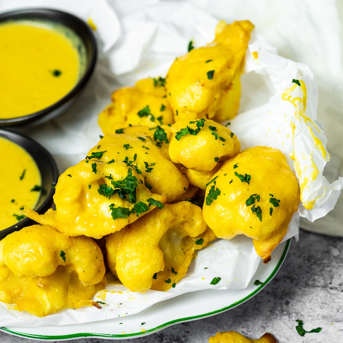 Vegan Honey Mustard Cauliflower Wings on a serving plate close up