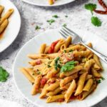 Three Plates with Penne in arrabiata sauce