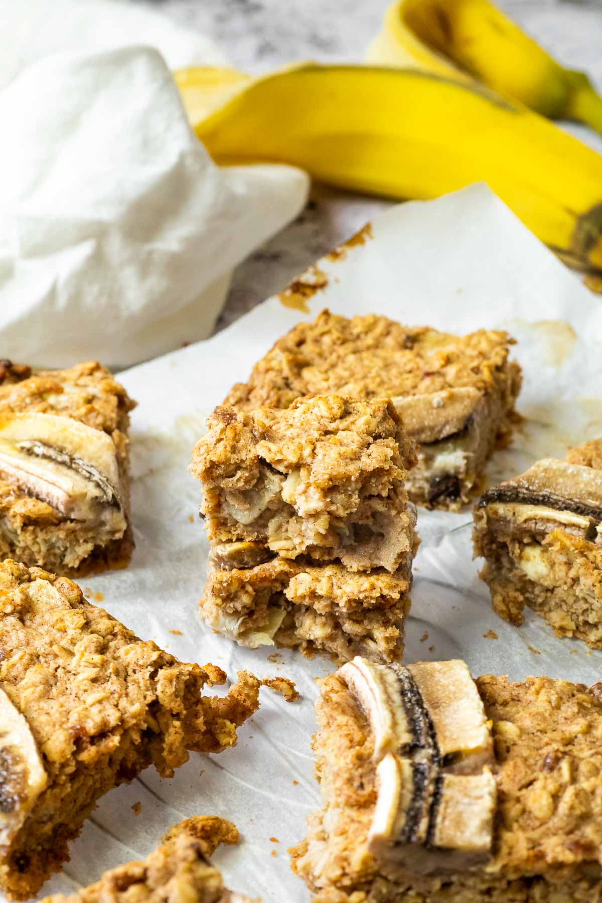 Vegan Oat Bars on a wire rack with 2 stacked on each other.