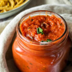 Close up of a jar with marinara sauce