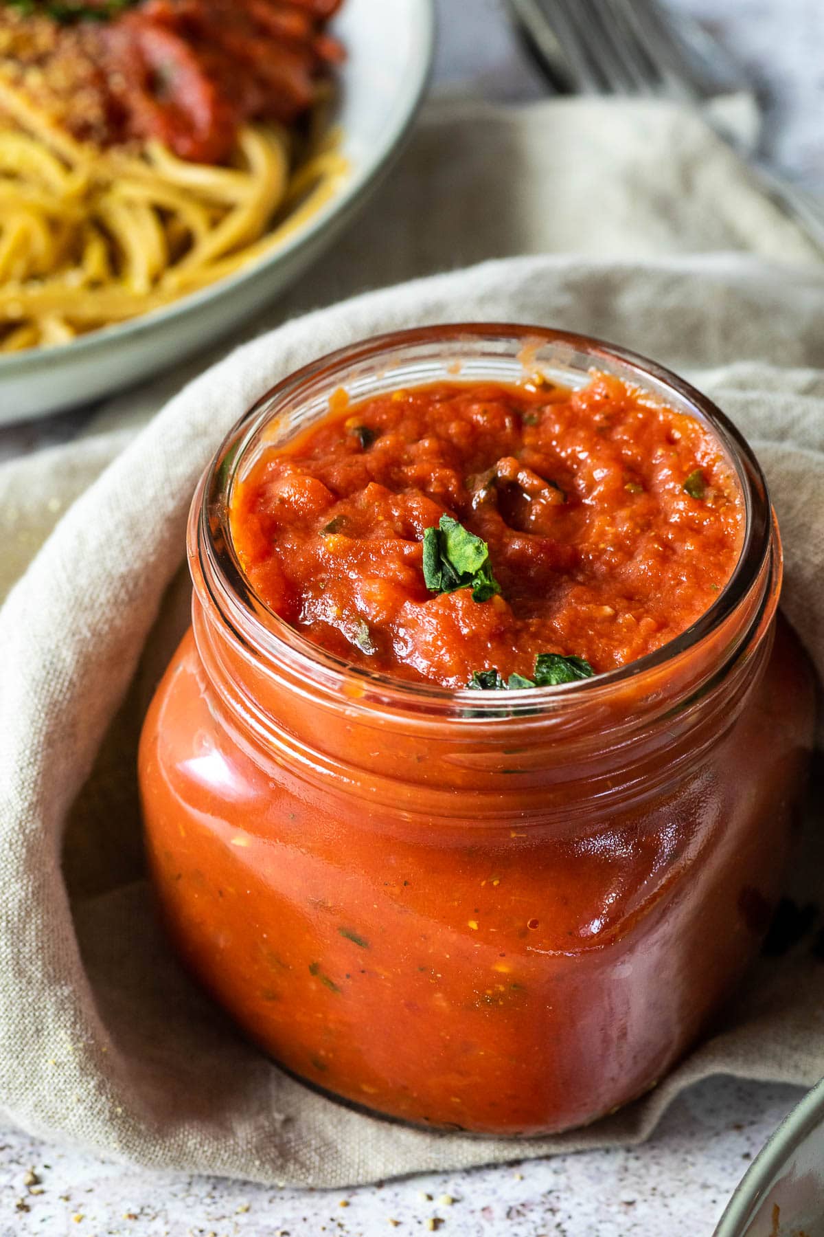 Close up of a jar with marinara sauce