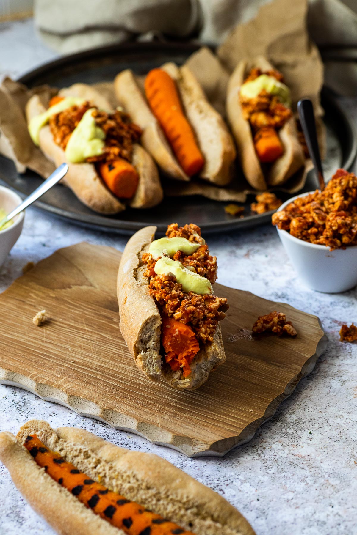 One vegan Chili Cheese Dog with one bite missing