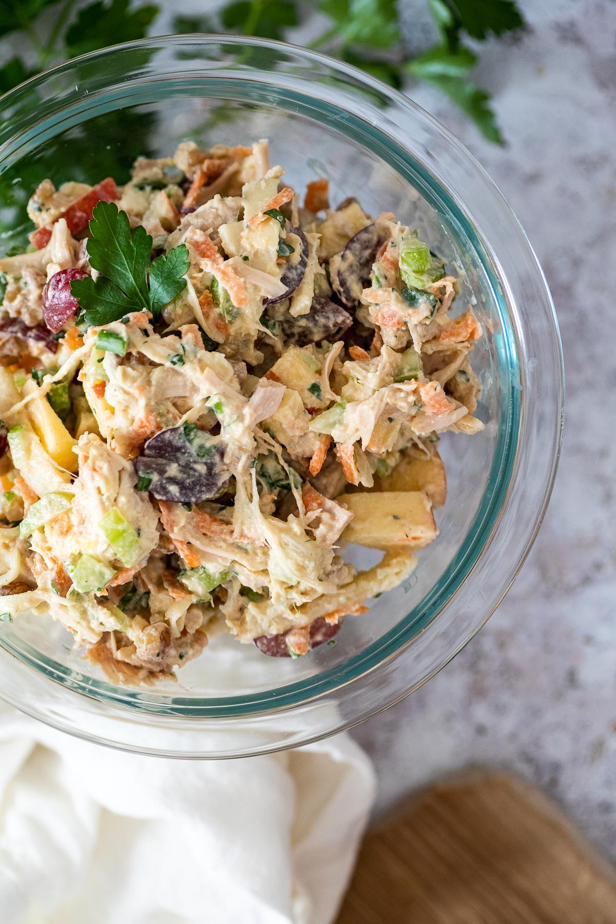 Chicken salad bowl in focus and rest blurred