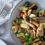 Bird View of vegan pasta salad with artichoke hearts