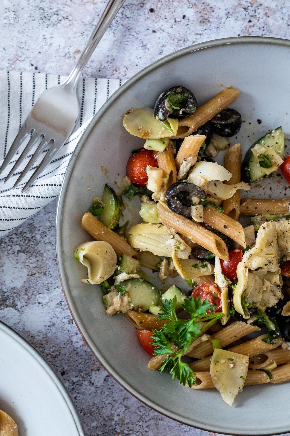 Bird View of vegan pasta salad with artichoke hearts