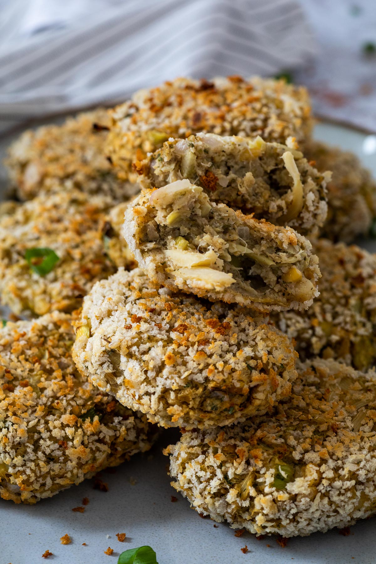 Close up of the vegan Crab crakes with one showing the texture