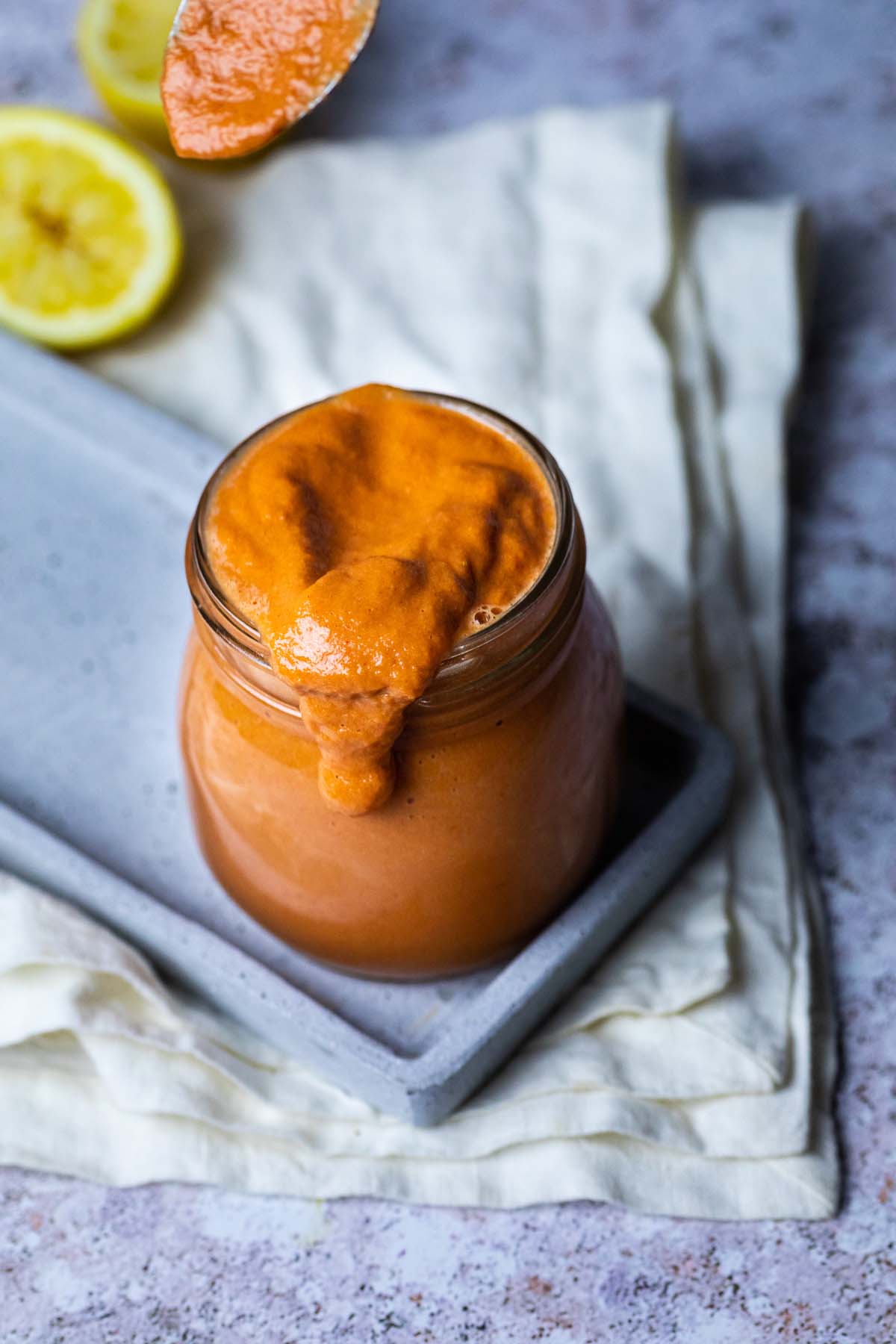 Oil free French Dressing is dripping over a jar